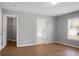 Bedroom featuring wood floors, closet, and beautiful views at 250 Grand Oaks Dr, Ladson, SC 29456
