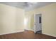 Open living area with modern flooring leading to a doorway and a glimpse of a bathroom at 250 Grand Oaks Dr, Ladson, SC 29456