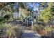 Community playground featuring a modern design with climbing structures, slides, and shaded seating areas at 250 Grand Oaks Dr, Ladson, SC 29456