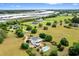 Beautiful property with a two-story home, pool, landscaping, and vast green space at 2636 Anchor Watch Dr, Wadmalaw Island, SC 29487