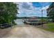 Community boat ramp with access to the water, ready for launching boats and enjoying the lake at 2636 Anchor Watch Dr, Wadmalaw Island, SC 29487