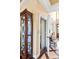 An accessible home elevator provides access between floors, and a wooden display case holds decorations at 2636 Anchor Watch Dr, Wadmalaw Island, SC 29487