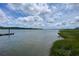 Expansive water view with lush green shoreline, creating a peaceful setting at 2636 Anchor Watch Dr, Wadmalaw Island, SC 29487