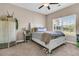 Bedroom with neutral walls, ceiling fan, and a decorative screen at 281 Jackson St, Goose Creek, SC 29445