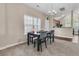 Cozy dining area with chandelier and lots of light near the living room and kitchen at 281 Jackson St, Goose Creek, SC 29445