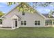 The well maintained exterior of this townhome features a covered front entrance and a screened back porch at 281 Jackson St, Goose Creek, SC 29445