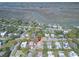Aerial view of a house nestled among trees, close to the waterway. Red pin indicates location at 3013 Middle St, Sullivans Island, SC 29482