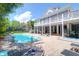 Expansive backyard with a pool, lounge chairs, and lush landscaping at 3013 Middle St, Sullivans Island, SC 29482