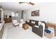 Comfortable living room features a sectional sofa, plush chairs, and a wooden trunk coffee table at 3013 Middle St, Sullivans Island, SC 29482