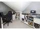 This unique office area features modern gray walls and white shelving at 3013 Middle St, Sullivans Island, SC 29482