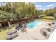 Inviting backyard featuring a private pool, lounge chairs, and a fenced yard for outdoor enjoyment at 3013 Middle St, Sullivans Island, SC 29482