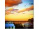 Beautiful sunset over the neighborhood rooftops at 3013 Middle St, Sullivans Island, SC 29482