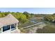 Charming home with a private dock extending into the marsh, surrounded by lush trees and natural beauty at 3104 Upda Creek, Seabrook Island, SC 29455