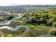 Scenic aerial shot of waterfront home with private dock, marsh views, and mature trees at 3104 Upda Creek, Seabrook Island, SC 29455