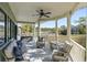 Spacious back porch with comfortable seating and a view of the marsh at 3104 Upda Creek, Seabrook Island, SC 29455