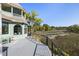Back porch with views of the surrounding green landscape at 3104 Upda Creek, Seabrook Island, SC 29455