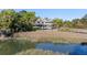 Stunning multi-story home surrounded by lush greenery and water views at 3104 Upda Creek, Seabrook Island, SC 29455