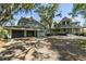 Lovely traditional style home with a large driveway and a detached three-car garage at 3104 Upda Creek, Seabrook Island, SC 29455