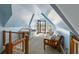Bright living area featuring a high ceiling and access to a balcony at 3104 Upda Creek, Seabrook Island, SC 29455