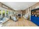 Spacious living room with hardwood floors, fireplace, and doors that lead to the outside at 3104 Upda Creek, Seabrook Island, SC 29455