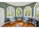 Bright sitting area with large windows and hardwood flooring at 3104 Upda Creek, Seabrook Island, SC 29455