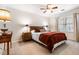 Relaxing bedroom featuring neutral paint, a ceiling fan, and comfy furniture at 312 E Shepard Ln, Summerville, SC 29483
