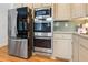 Stainless steel appliances featured in kitchen with wood flooring at 312 E Shepard Ln, Summerville, SC 29483