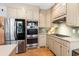 Updated kitchen features stainless steel appliances, gas cooktop, and light countertops at 312 E Shepard Ln, Summerville, SC 29483