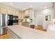 Kitchen with tile backsplash, stainless steel appliances, and neutral-toned cabinets at 312 E Shepard Ln, Summerville, SC 29483