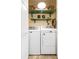 Laundry room with washer, dryer, and shelving at 312 E Shepard Ln, Summerville, SC 29483