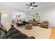 Spacious living room with hardwood floors and an open view into the kitchen at 312 E Shepard Ln, Summerville, SC 29483