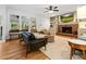 Inviting living room featuring hardwood floors, fireplace, and comfortable seating arrangement at 312 E Shepard Ln, Summerville, SC 29483