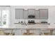 Modern kitchen with granite countertops, stainless steel appliances, and ample cabinet space at 314 Archar St, Summerville, SC 29486