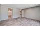 Spacious bedroom with attached bath and another room, and wood-look flooring at 317 Marion Rd, Dorchester, SC 29437