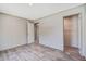 Bedroom features wood-look floors, access to closet and attached bath at 317 Marion Rd, Dorchester, SC 29437