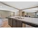 Kitchen island featuring sink, white countertops, and stainless steel dishwasher at 317 Marion Rd, Dorchester, SC 29437