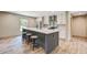 Spacious kitchen featuring a large island with seating and stainless steel appliances at 317 Marion Rd, Dorchester, SC 29437