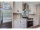 Close-up of kitchen featuring stainless steel appliances and white cabinetry at 317 Marion Rd, Dorchester, SC 29437