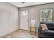 Bright living area features sleek flooring, modern lighting, and comfortable seating at 317 Marion Rd, Dorchester, SC 29437