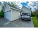 Attached garage with an asphalt driveway, offering convenient parking space at 320 Foxglove Ave, Summerville, SC 29483