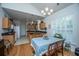 Eat-in kitchen with wood cabinets, granite countertops, and a breakfast bar at 320 Foxglove Ave, Summerville, SC 29483