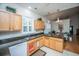 Kitchen featuring wood cabinets, black countertops, and a stainless steel sink at 320 Foxglove Ave, Summerville, SC 29483