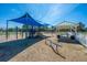A colorful community playground with a slide, climbing structures, and shaded areas for children to enjoy at 320 Foxglove Ave, Summerville, SC 29483