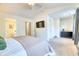 This bedroom features a plush bed and doorway to the ensuite bathroom offering comfort and convenience at 3208 Pecan Orchard Way, Charleston, SC 29414