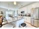 Well-appointed kitchen boasts a large island, stainless steel appliances, and modern finishes throughout the space at 3208 Pecan Orchard Way, Charleston, SC 29414