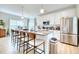Spacious kitchen features a large island, stainless steel appliances, and ample cabinet space for storage at 3208 Pecan Orchard Way, Charleston, SC 29414