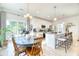 Well-lit kitchen features an eat-in area, stainless steel appliances, and ample counter space for meal preparation at 3208 Pecan Orchard Way, Charleston, SC 29414
