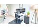 Bright office space with a file cabinet, workstation, two monitors, and a view of the doorway at 3208 Pecan Orchard Way, Charleston, SC 29414
