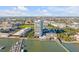 Stunning aerial view of a waterfront condo building with marina and city skyline at 330 Concord St # 18F, Charleston, SC 29401