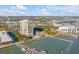 A beautiful aerial view of a waterfront condo complex, marina and green spaces at 330 Concord St # 18F, Charleston, SC 29401